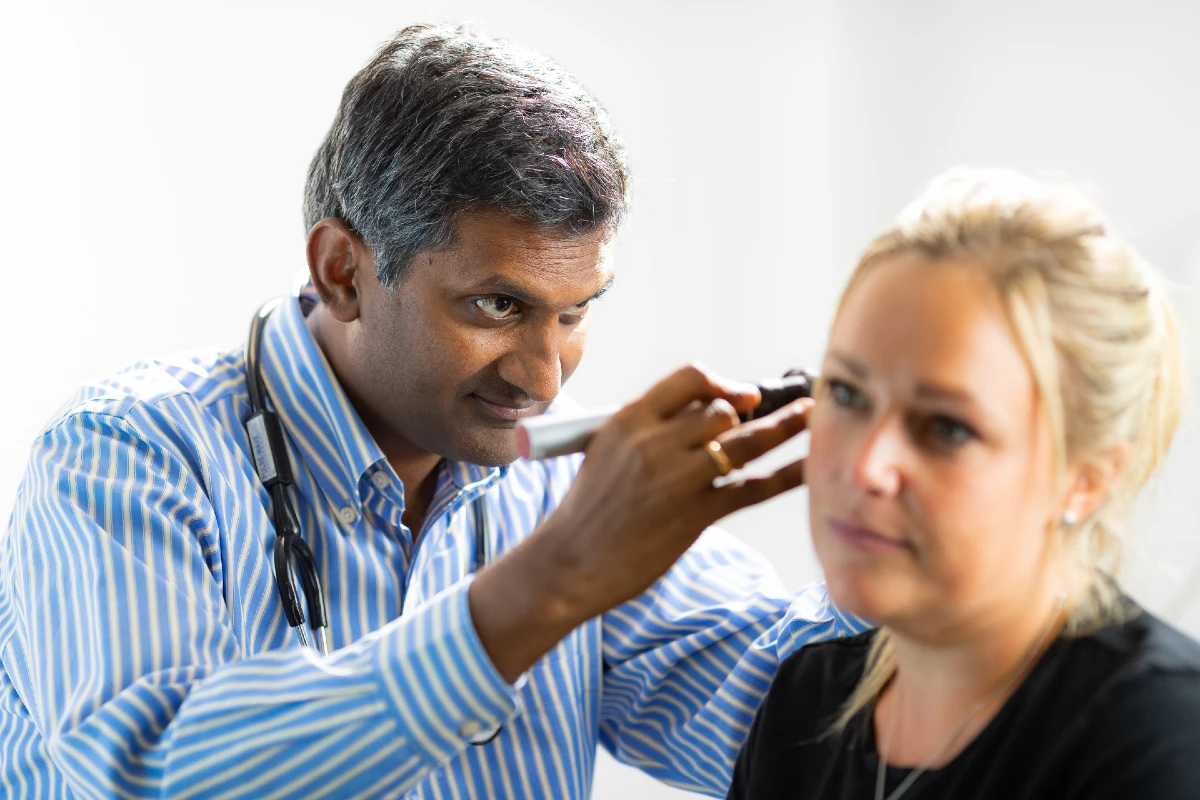 Image of a patient being examined by a doctor